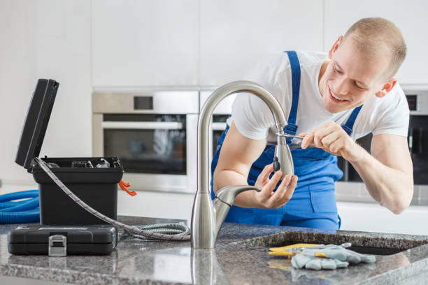 Profession Plumber fixing faucet in San Diego